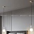 Серия подвесных светильников со стеклянным шарообразным плафоном и декором из натурального мрамора PETIT A фото 15