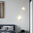 Серия подвесных светильников с шарообразными плафонами и светящимися кольцами на двух металлических стойках SKARVIK модель C золотой фото 15