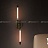 Настенный светильник с двумя плафонами вытянутой цилиндрической формы на металлическом основании VALA WALL A латунь фото 11