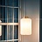 Серия подвесных светильников с гофрированным цилиндрическим абажуром молочного цвета со стилизованным под дерево основанием ILSE фото 6