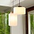 Серия подвесных светильников с гофрированным цилиндрическим абажуром молочного цвета со стилизованным под дерево основанием ILSE фото 15